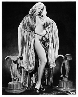 Lili St. Cyr poses for a Bruno Bernard promo photo, wearing her &ldquo;chastity belt&rdquo;..