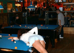 ilovewatchingmywife:  While playing pool at our favorite bar, she goes bare underneath her skirt, looking for potential cock. 
