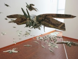machine-factory:  A swarm of locusts made entirely out of money. New installation by Origami artist Sipho Mabona on display at the Japanese American National Museum in Los Angeles.  Money, our prime signifier of both ambition and perdition. Money has