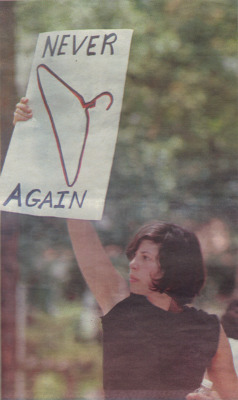 maleficus-juicy:  “never again” This image is one of the most powerful pro-choice images I’ve ever seen. When I saw it in the newspaper I immediately cut it out and hung it on my wall. This is not my image. I’m using it with permission from Arthur