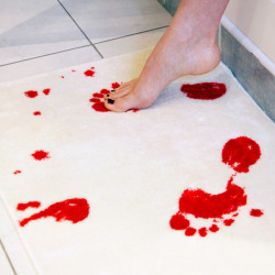 koncreates:  damn-the-jam:  loveissuchalovelytorture:   shark-bones:   Bath mat turns red when wet.  I need towels made out of this, and then I’d make my guests use them with out telling them. Then wait for the screams of terror.   Calm down there,