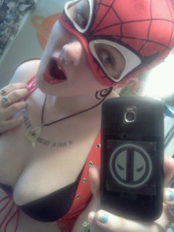 zombieerotica:  4/18/12: There’s something sad about me making a functional Spidergirl outfit just out of shit in my closet. Also, don’t mind my face. More important: Deadpool phone. 