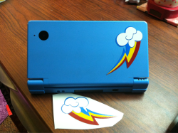 dead-pants:  Just wanted to show off my now 20% COOLER Nintendo DSi. Grabbed it off of Vinylbot, and I highly recommend these decals. High quality stuff, and the guy was even willing to cut me a smaller size than the shop provided. If you’re ever looking