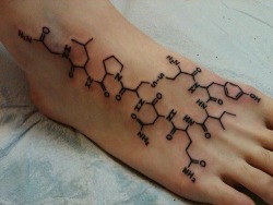 andrewbreitel:  A tattoo of an oxytocin molecule, the hormone that makes one fall in love. 