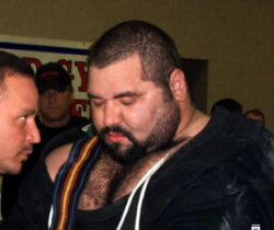 I love when chest hair and facial hair meet on a big man. Damn.