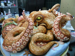 justamus:  archiemcphee:  This incredibly awesome Octopus Cake was made by Karen Portaleo at the Highland Bakery in Atlanta, Georgia. It weighed in at an impressive 200 beautiful, be-tentacled pounds. And we sorely wish we could have sampled a slice.