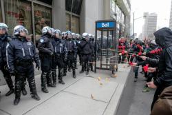 greviousmentalharm:  professionaltwerk:  suckmyphallus:   Montreal student protesters baiting riot police with donuts.  canada  SCREAMING  Please tell me one of the officers with a sense of humour took one 