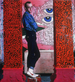 80sdeco:  Keith Haring in Guess jeans, red and black and hot pink columns, bubbling monster wall mural arthistoryx Today would have been Keith Haring’s 54th Birthday.RIP Baby Boy  