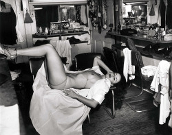Between shows, famed photographer WeeGee captures an image of Kalantan (aka. Mary Ellen Tillotson) catching some Zzz&rsquo;s in her dressing room..