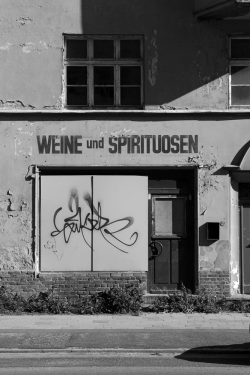 eastberliner:  An abandoned shopfront , found last weekend at the eastgerman coast in a city called stralsund . I love the old DDR typo , its kinda crazy that those places still exist more than 20 years after the reunification . The window shopping is