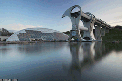 climateadaptation:  This is a boat lift.  The Falkirk Wheel Designed by Scottish architecture firm, RMJM, the Falkirk Wheel is boat lift in central Scotland that connects two canals. Previously 11 locks were required to connect the canals which differ