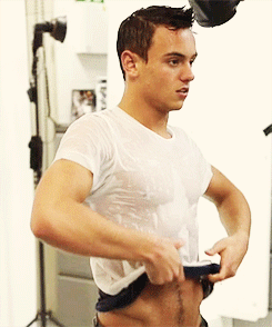 boy-meets-life:  fancymen:  youareanobject:  Catching up on the news.  More Fancy Men Here  Tom Daley