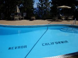 sisterhudson:  foxbabies:  rvndy:  hugsandhairtugs:  At the Cal-Neva Lodge in Lake Tahoe, the Nevada/California state line actually runs through the swimming pool. Fun fact:  Cal-Neva was once co-owned by Frank Sinatra.  This is cool as fuck cause you