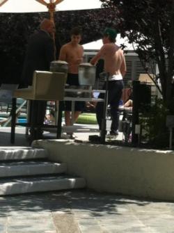 gossip-paul:   Niall and Liam poolside 6/19/12  Niall? You’re wearing jeans. At the pool.   