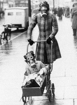 cruello:  Mother and child wearing their gas masks  Southend, 29 March 1941. Photo: Associated Press 