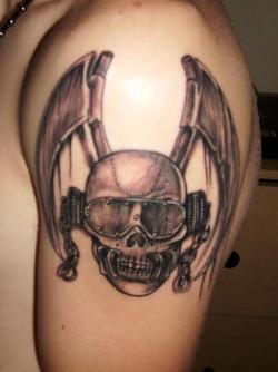 fuckyeahtattoos:  This is a tattoo of Vic Rattlehead, the mascot for the band Megadeth. I got it at Hollywood’s Twisted Needle Tattoos in Valdosta, GA. Megadeth has always been a very influential band for me, and it is what I am known for.