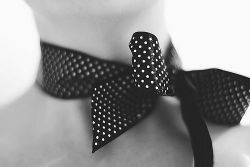 I like the sweetest of the ribbon around her neck. The polka-dots make it whimsical.