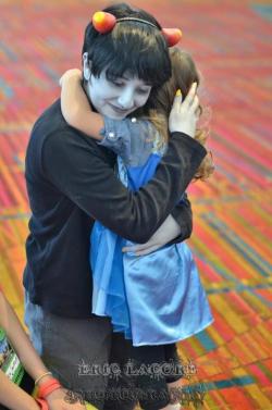 pocket-pixie:  Okay, my turn for a heartwarming Homestuck story: So on saturday of CTcon, this little girl came up to me and a couple of other homestucks are hanging out on the second floor.  She was interested in our outfits and asked what they were. 
