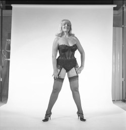 An older Jennie Lee poses in-studio for a Fan Club photo set..