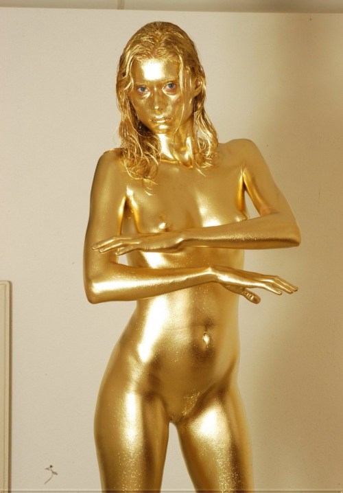 Nude body paint gold girl