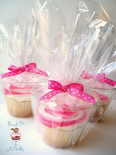 Looking for a way to Perfectly Package Your Cupcakes? Why not try a 9oz Plastic Cup, Clear Cellophane wrap and a Ribbon?  Quick Easy and Affordable!  Click on the photo to check out the complete tutorial.