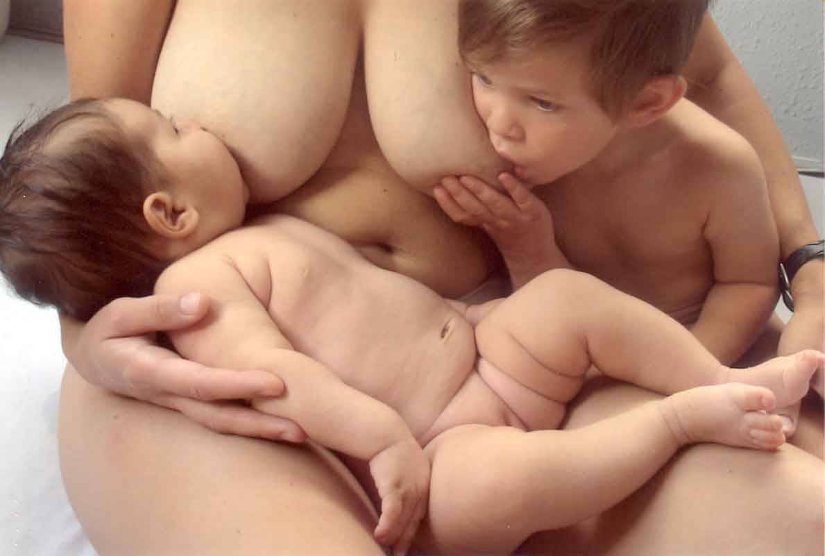 Woman breastfeeding animals