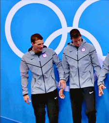 heavens2betsy:  Michael Phelps having fun during the Olympic Medal Ceremony.  
