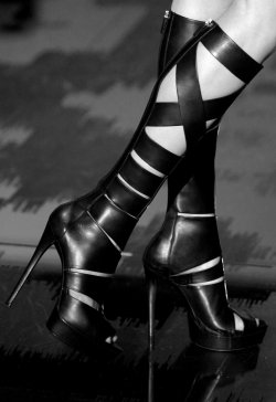 Dominatrix-style boots by Gucci