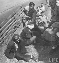 sura93:  Zionist troops blindfolding/kidnapping Polish fighters that supported the Palestinians, May 1948. John Phillips. This is Zionism. 