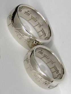 godtricksterloki:  kaylahemsworth:  guernica322:  lainalulu:  aryssarynn:  Wedding rings! The elvish engraving says: “One ring to show our love, one ring to bind us, one ring to seal our love and forever entwine us.” I’m geeking out so hard right