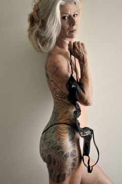 positivehardcore:  boobscupcakesnweed:   For anyone who says “Oh my god what will your tattoos look like when you get older??!?!?!?!!” Bitchin’ is the answer.  She looks wonderful  gilf 