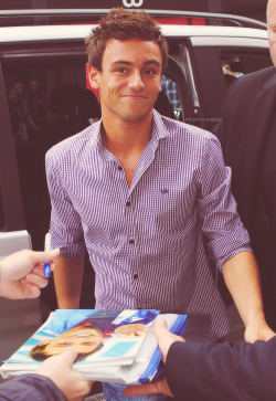 ghostindamirror:  Tom Daley arrives for his book signing at the Adidas Shop on Oxford Street on August 15, 2012 in London, England.  