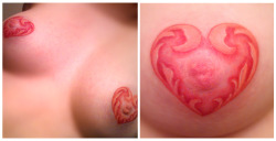 c0stell0:  taytat:  nipple tattoos!  i see so many people with the really simple heart outlined nipple tattoos or the star outline. too boring. wanted to do something different. this also happens to be my first color tattoo! yay! i constantly feel like