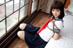 Naughty schoolgirl put in shibari bondage