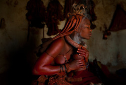 undreaming:  The Himba Women of northern Namibia perform daily rituals whereby they anoint themselves with a mixture of ochre, oil and ash to protect themselves from the harsh desert climate. They never take a shower, but rather burn aromatic herbs in