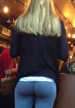 Girl showing off her tight butt in yoga pants