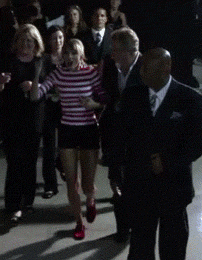 funkicoldmedina:  d-rty:  schwooop:   Taylor Swift and Kanye… wtf I’m missing something here  She sure seems super excited to see him though. Coo.  you fucking idiots it’s kevin hart not kanye  im pretty sure thats kevin hart…..