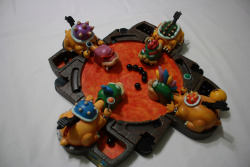 tinycartridge:  Hungry Hungry Koopas, a customized version of Hasbro’s famous board game from Donald “KodyKoala” Kennedy, replacing hippos with Bowser and his progeny. Buy: New Super Mario Bros. 2See also: More excellent KodyKoala pieces[Via KodyKoala]