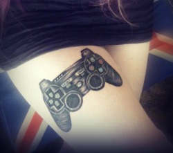 fuckyeahtattoos:  Tattoo #16: Playstation controller. This tattoo was done by my amazing tattooist in Tasmania, Australia.  This picture was taken half an hour after the tattoo was completed, so there is a lot of swelling, blood, smudging, &amp; shine