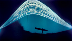 loveallthis:  Crazy good.  This gorgeous photo of a statue in England called The Angel of the North was taken by Justin Quinnell, over the course of three months, using a pinhole camera made out of a beer can. Yes, the parabola is the path of the Sun,
