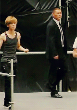  Luhan in a wifebeater (chatting with Kris) 