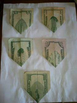 niggaaron:  maomi:   Conspiracy or Coincidence? If looked at close the five dollar bill represents the twin towers, the ten is after the planes collided, the twenty shows a building colapsing, the fifty is the dust and smoke, and the hundred is a new