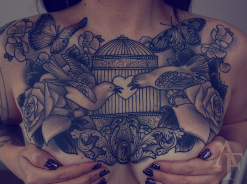 Religious chest piece tattoos