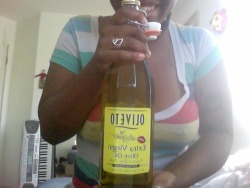 i bought this big ass bottle of olive oil, and its only for my hair. if i find out somebody stole some and cooked with it, there.will.be.blood.