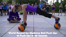 britsfit:  tonedgoals:  fitnessgifs4u:  World Record for Medicine Ball Push-ups - 61 Push Ups, in 60 Seconds  Why doesn’t this have more notes omg   So intense! Good for her! 