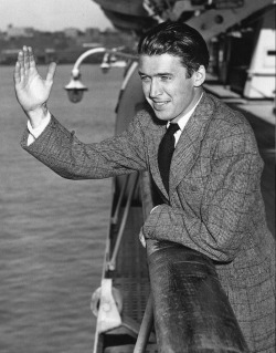 lars134:  Jimmy Stewart waves goodbye from the deck of the Italian superliner ‘Conte Di Savoia’ as the ship backs away from her Manhattan pier on August 3, 1939. Stewart was one of the thousands of American tourists who were stranded in Europe when