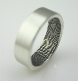 elixirouss:  elixirouss:  &ldquo;her finger print inside your wedding ring&rdquo; Gahh I want this!  Can’t believe I blogged this over a year ago and it has this many notes 