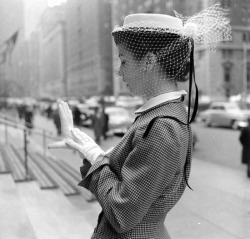 theniftyfifties:  Model wearing a spring hat, 1950. Photo by Gordon Parks. 