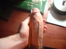 fuckyeahhugepenis:  Measuring up pretty well against the pencil. damn fatty dick! 