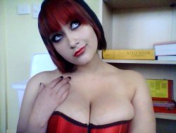 moniicow:  Rocking Manic Panic’s Rock n Roll Red and a rockin’ red corset 
